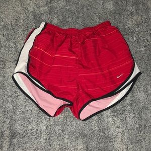 red nike shorts